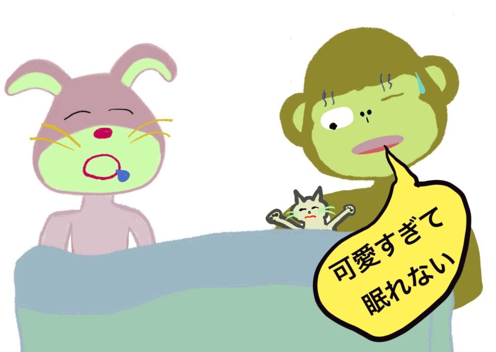 猫の腕枕に寝不足のサル